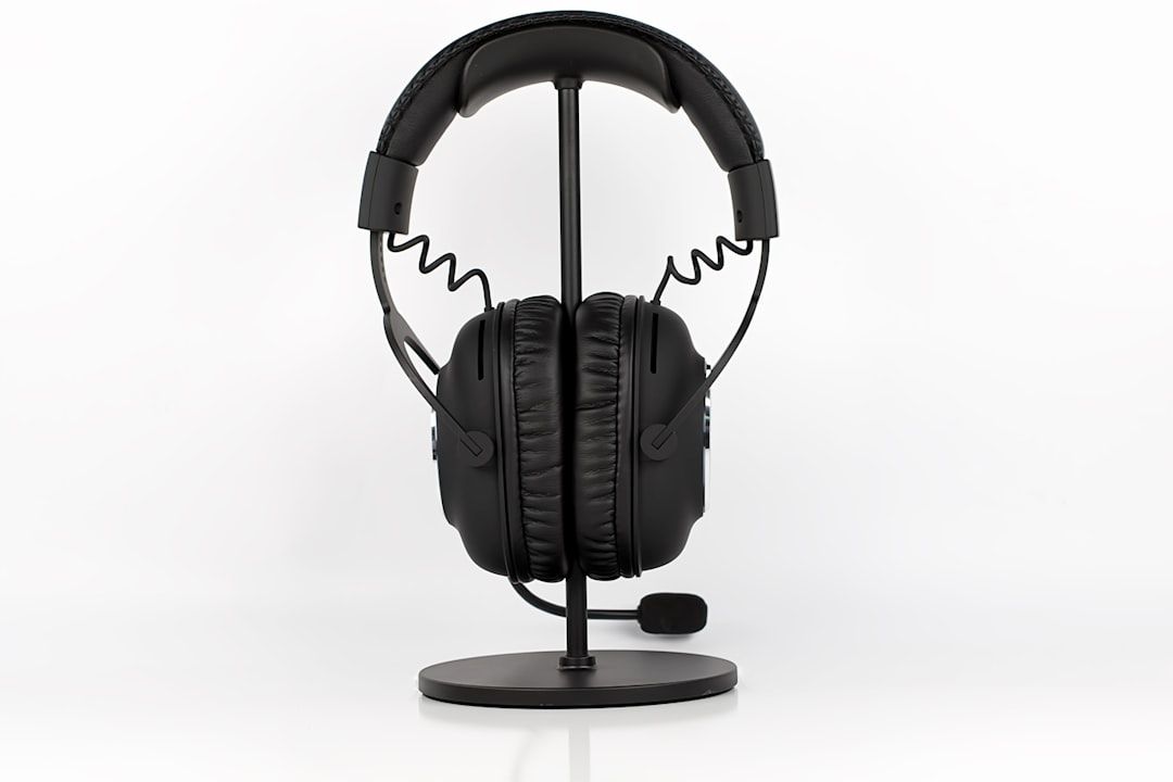 a pair of headphones sitting on top of a stand