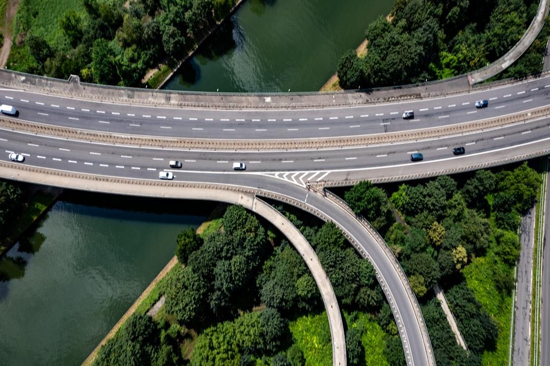 An aerial view of a highway and a river